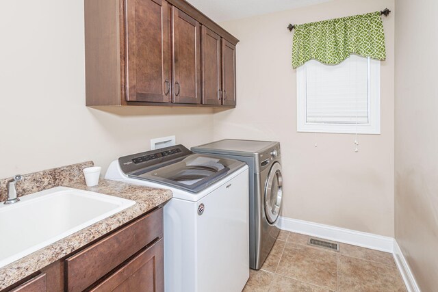 4105 Astoria Way, Columbia, MO 65203 - laundry room with washer and dryer, cabinet space, and baseboards