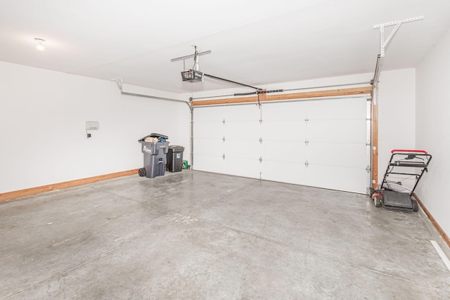4105 Astoria Way, Columbia, MO 65203 - garage featuring a garage door opener and baseboards