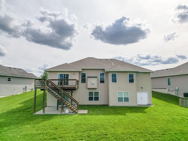 4105 Astoria Way, Columbia, MO 65203 - rear view of house featuring stairs, a wooden deck, a yard, and a patio area