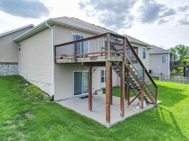 4105 Astoria Way, Columbia, MO 65203 - rear view of property featuring stairway, a patio area, and a deck