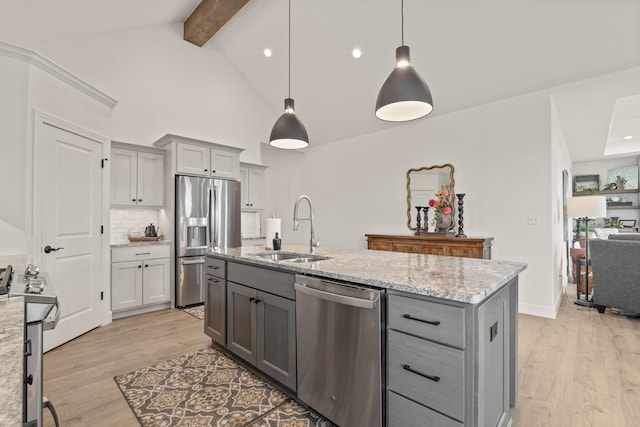 1104 Caymus Ct, Columbia, MO 65201 - kitchen with stainless steel appliances, gray cabinetry, a sink, beam ceiling, and light wood-style flooring