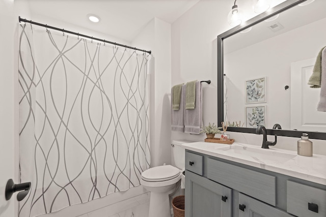 1104 Caymus Ct, Columbia, MO 65201 - bathroom featuring vanity, toilet, marble finish flooring, and recessed lighting