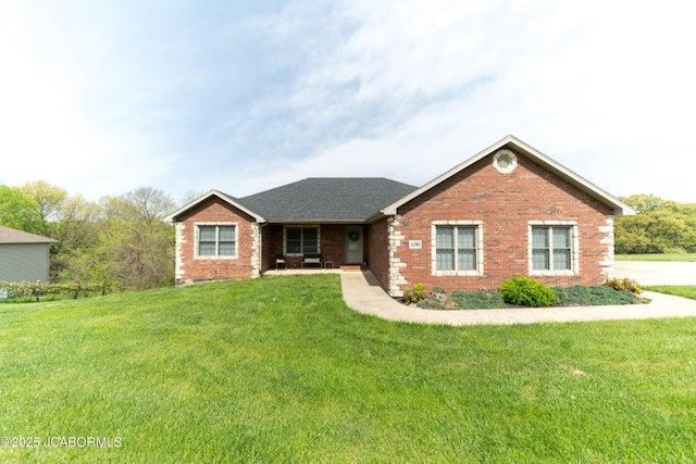 1200 Choctaw Ridge Dr, Holts Summit, MO 65043 - ranch-style home with brick siding and a front yard