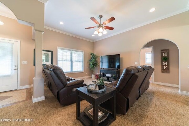 1200 Choctaw Ridge Dr, Holts Summit, MO 65043 - living room featuring light carpet, ceiling fan, baseboards, plenty of natural light, and crown molding