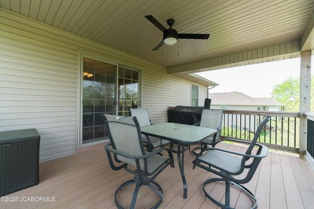 1200 Choctaw Ridge Dr, Holts Summit, MO 65043 - deck with a ceiling fan and outdoor dining area