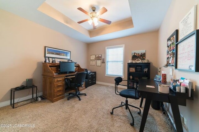 1200 Choctaw Ridge Dr, Holts Summit, MO 65043 - office space featuring a ceiling fan, baseboards, carpet flooring, and a tray ceiling