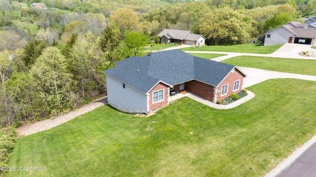 1200 Choctaw Ridge Dr, Holts Summit, MO 65043 - aerial view of property and surrounding area featuring a forest