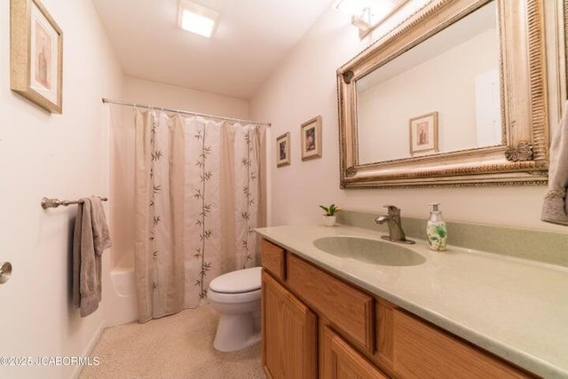 bathroom featuring toilet, vanity, and shower / tub combo
