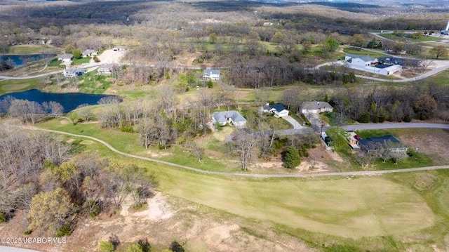 aerial overview of property's location featuring a nearby body of water