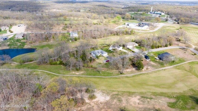 aerial overview of property's location with a large body of water and a golf course