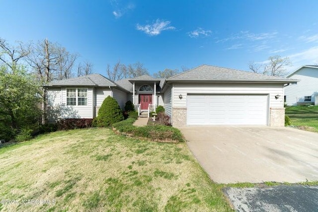 ranch-style home with a garage, driveway, brick siding, and a front lawn