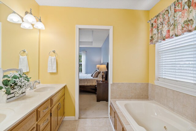 2313 Katy Ln, Columbia, MO 65203 - bathroom with ensuite bath, a tub with jets, tile patterned floors, and double vanity