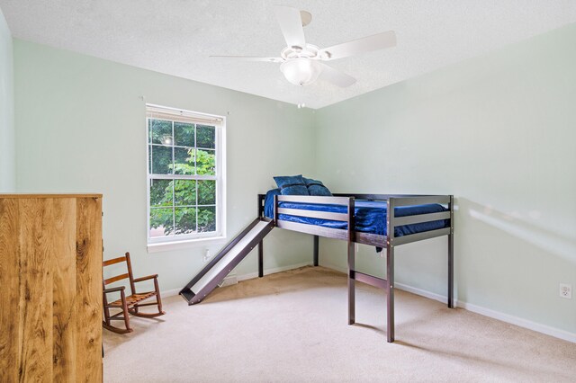 2313 Katy Ln, Columbia, MO 65203 - carpeted bedroom featuring baseboards and ceiling fan