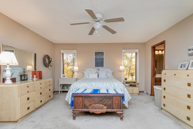 2512 Cimarron Dr, Columbia, MO 65203 - bedroom featuring light colored carpet, multiple windows, baseboards, and a ceiling fan
