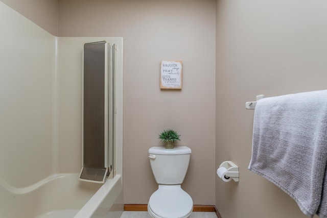 2512 Cimarron Dr, Columbia, MO 65203 - bathroom with toilet, baseboards, a shower, and a tub to relax in