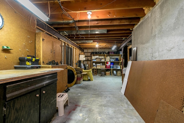 2512 Cimarron Dr, Columbia, MO 65203 - unfinished below grade area with a workshop area