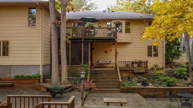 2512 Cimarron Dr, Columbia, MO 65203 - back of property featuring a balcony and a wooden deck