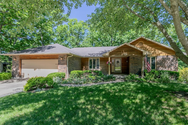 2512 Cimarron Dr, Columbia, MO 65203 - ranch-style home with brick siding, a garage, concrete driveway, and a front yard