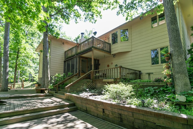 2512 Cimarron Dr, Columbia, MO 65203 - back of property with a balcony and a wooden deck
