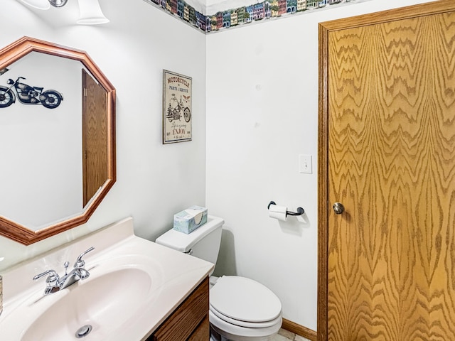 7495 E Schooler Rd, Centralia, MO 65240 - bathroom featuring toilet and vanity