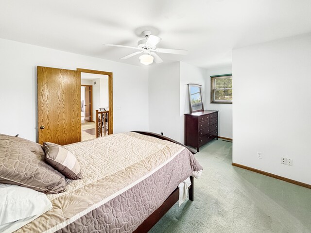 7495 E Schooler Rd, Centralia, MO 65240 - bedroom featuring carpet flooring, baseboards, and a ceiling fan