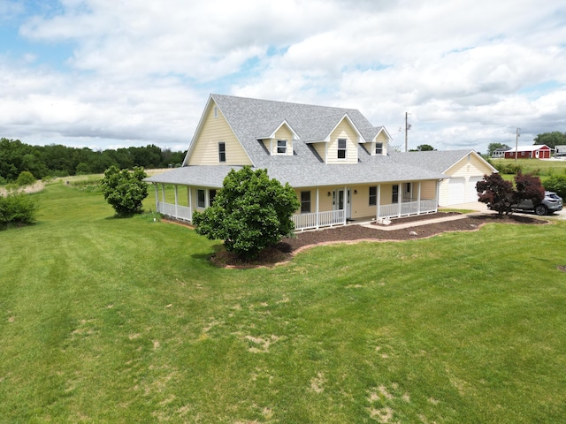7495 E Schooler Rd, Centralia, MO 65240 - country-style home featuring covered porch, a shingled roof, a garage, and a front yard