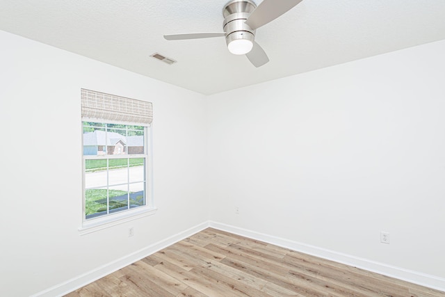 1050 Azoros Dr, Columbia, MO 65203 - spare room featuring light wood-type flooring, baseboards, and a ceiling fan