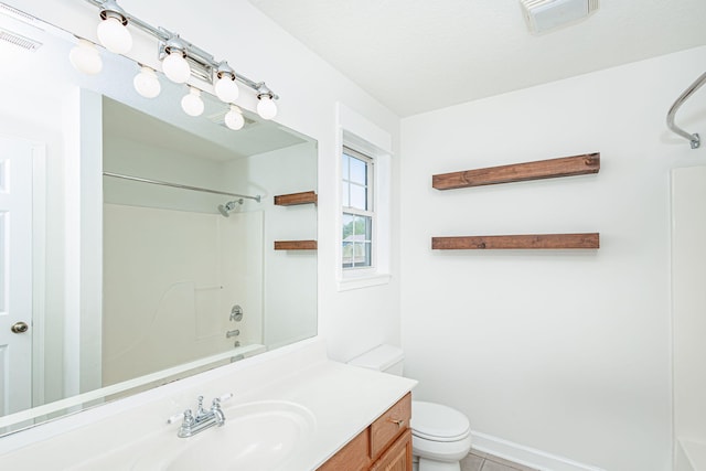 1050 Azoros Dr, Columbia, MO 65203 - bathroom with vanity, shower / bathtub combination, toilet, tile patterned flooring, and baseboards