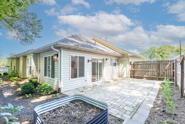 1050 Azoros Dr, Columbia, MO 65203 - back of house featuring a patio