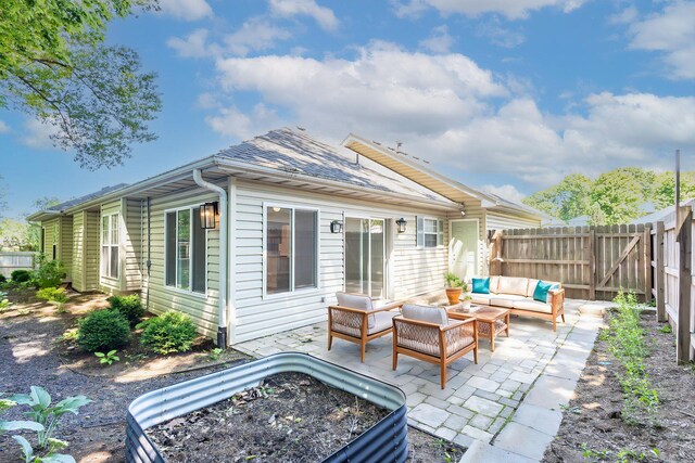 1050 Azoros Dr, Columbia, MO 65203 - back of property with outdoor lounge area and a patio
