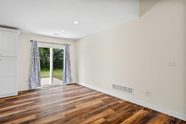 5111 Democracy Dr, Ashland, MO 65010 - unfurnished room featuring wood finished floors, baseboards, and recessed lighting
