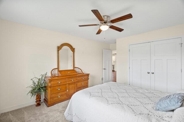 5111 Democracy Dr, Ashland, MO 65010 - bedroom with carpet floors, a closet, ceiling fan, and baseboards
