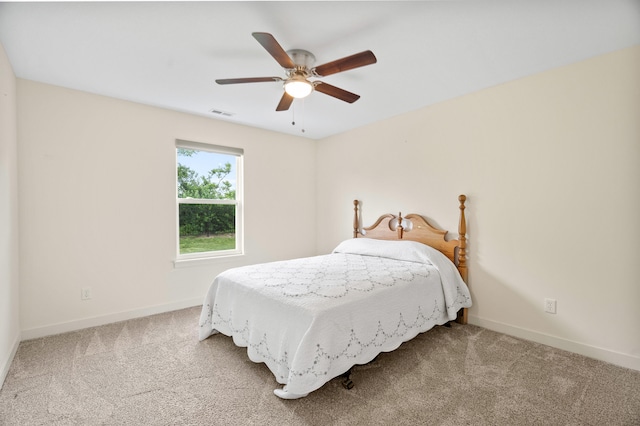 5111 Democracy Dr, Ashland, MO 65010 - bedroom featuring carpet flooring, baseboards, and a ceiling fan