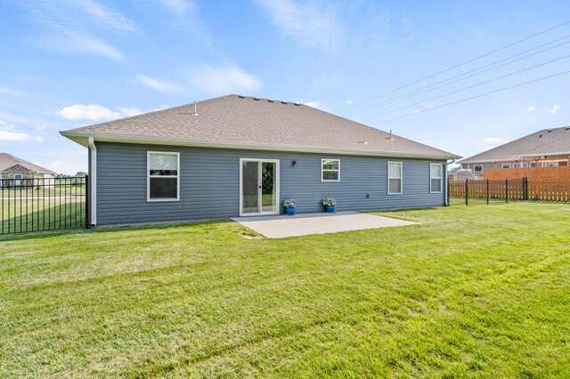 5111 Democracy Dr, Ashland, MO 65010 - back of house featuring a patio and a shingled roof
