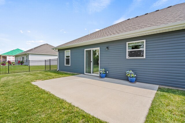 5111 Democracy Dr, Ashland, MO 65010 - rear view of house featuring a patio and roof with shingles