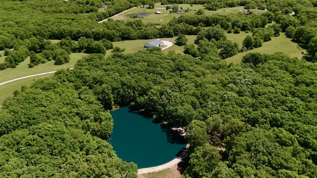 5100 E Dunbar Ln, Centralia, MO 65240 - drone / aerial view of a nearby body of water and a forest