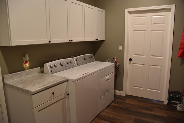 5100 E Dunbar Ln, Centralia, MO 65240 - laundry area featuring washer and clothes dryer, cabinet space, dark wood finished floors, and baseboards