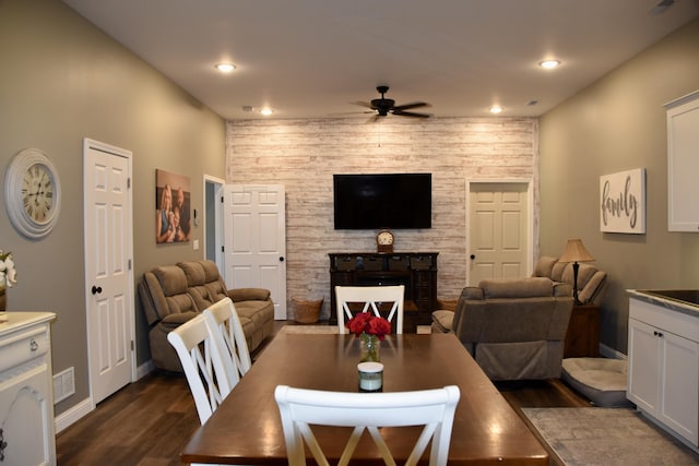 5100 E Dunbar Ln, Centralia, MO 65240 - dining space with a ceiling fan, dark wood-style floors, a fireplace, baseboards, and recessed lighting