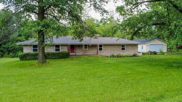 1804 N Pin Oak Blvd, Columbia, MO 65202 - ranch-style house featuring a front lawn, a garage, driveway, and brick siding