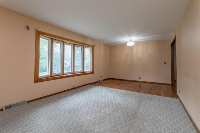 1804 N Pin Oak Blvd, Columbia, MO 65202 - carpeted spare room with baseboards