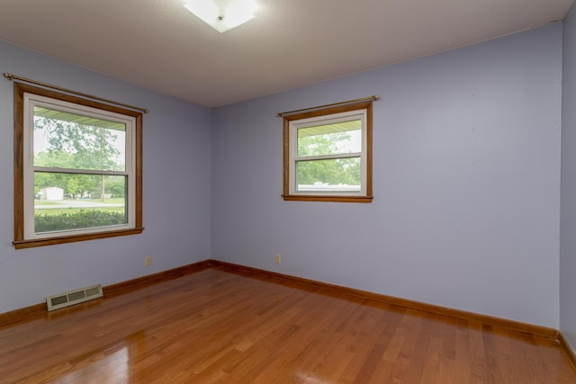 1804 N Pin Oak Blvd, Columbia, MO 65202 - spare room with baseboards and light wood finished floors