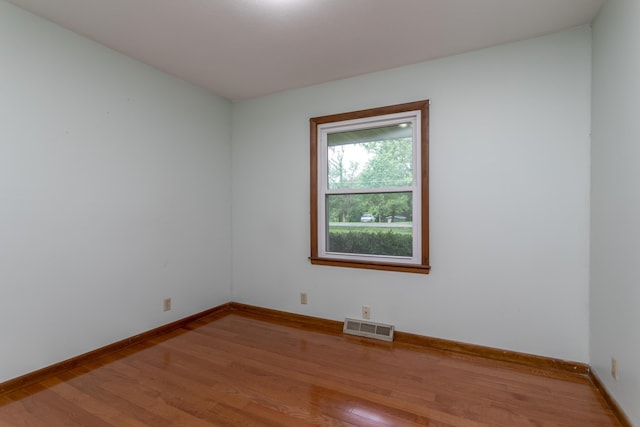 1804 N Pin Oak Blvd, Columbia, MO 65202 - unfurnished room with wood finished floors and baseboards