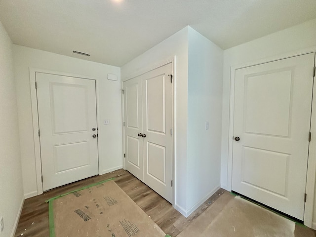 2505 Nest Ct, Columbia, MO 65202 - entryway with baseboards and wood finished floors