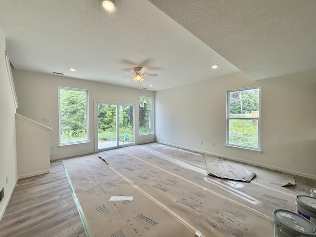 2505 Nest Ct, Columbia, MO 65202 - unfurnished room featuring baseboards, a ceiling fan, light wood-type flooring, recessed lighting, and a textured ceiling