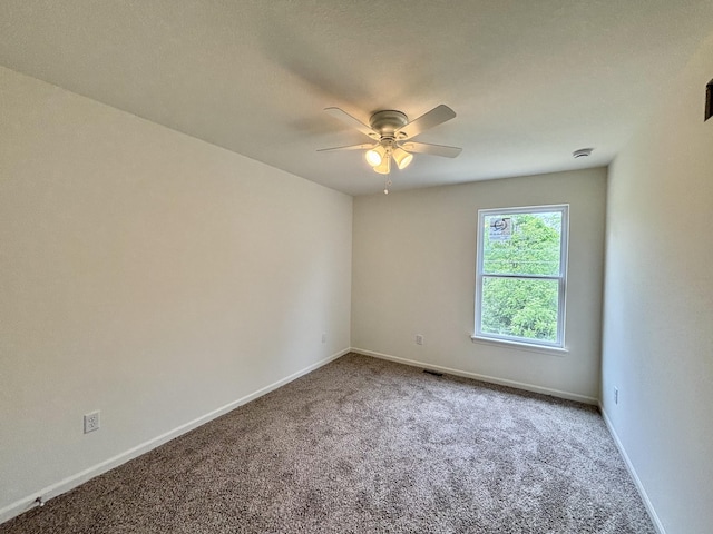 2505 Nest Ct, Columbia, MO 65202 - carpeted spare room featuring ceiling fan and baseboards