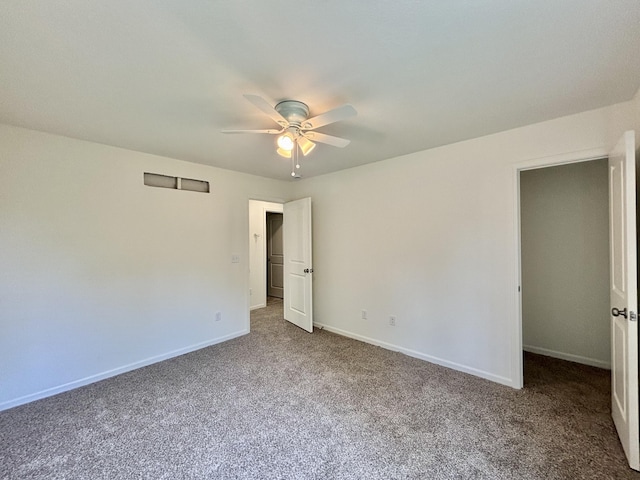 2505 Nest Ct, Columbia, MO 65202 - unfurnished bedroom featuring carpet floors, baseboards, and a ceiling fan