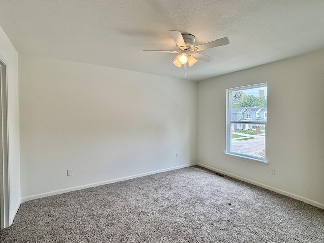 2505 Nest Ct, Columbia, MO 65202 - carpeted empty room featuring a ceiling fan and baseboards