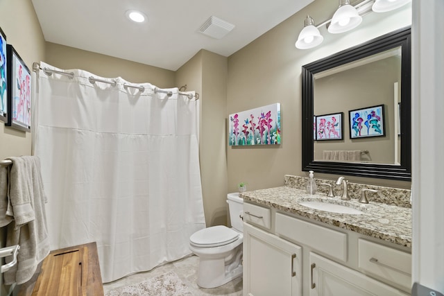 1732 Linkside Dr, Columbia, MO 65201 - bathroom featuring toilet, vanity, tile patterned flooring, and recessed lighting