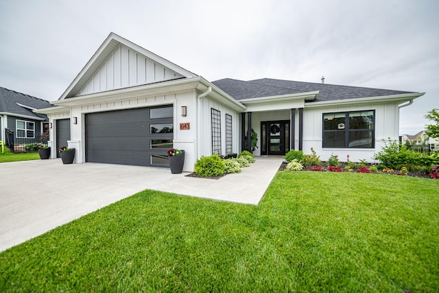 1043 Shore Acres, Columbia, MO 65201 - modern inspired farmhouse with a garage, board and batten siding, concrete driveway, a front lawn, and a shingled roof