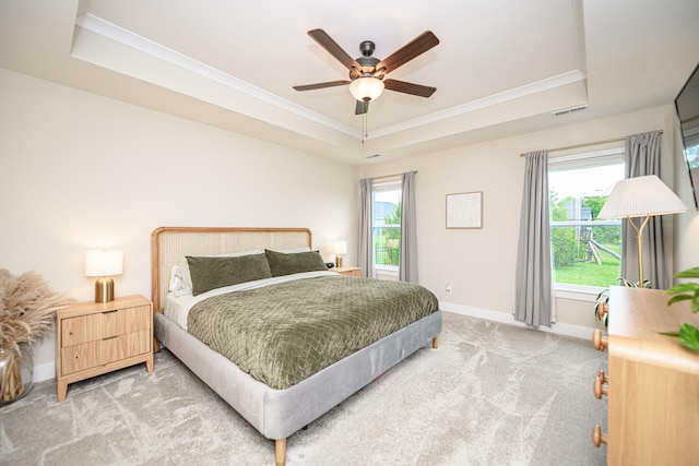 1043 Shore Acres, Columbia, MO 65201 - carpeted bedroom featuring a raised ceiling, baseboards, ornamental molding, and ceiling fan